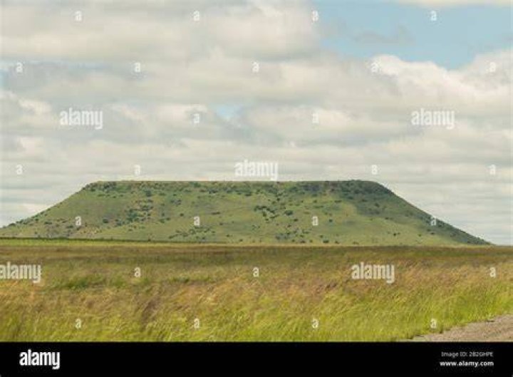 How are flat topped hills formed