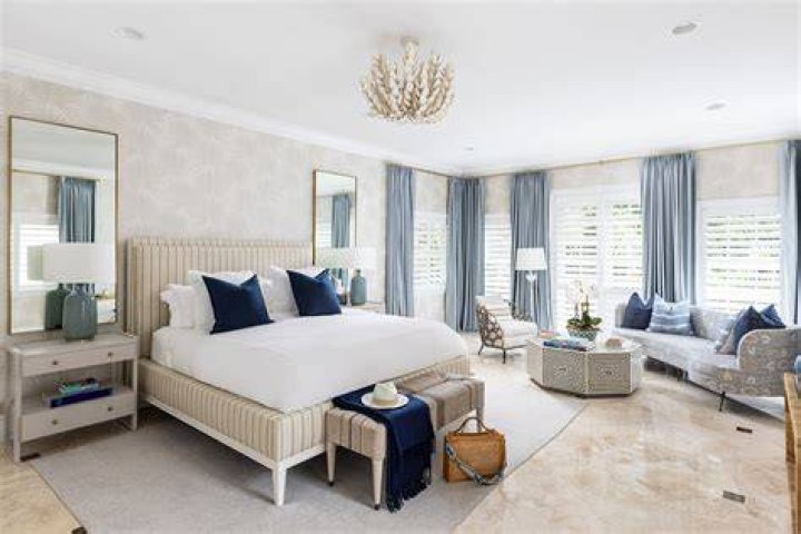How do you accessorize a white bedroom