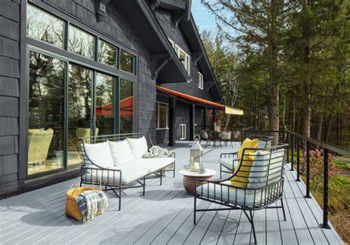 How do you lighten dark cedar siding