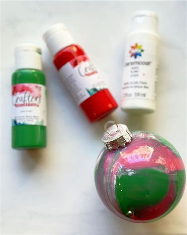 How do you paint plastic ball ornaments