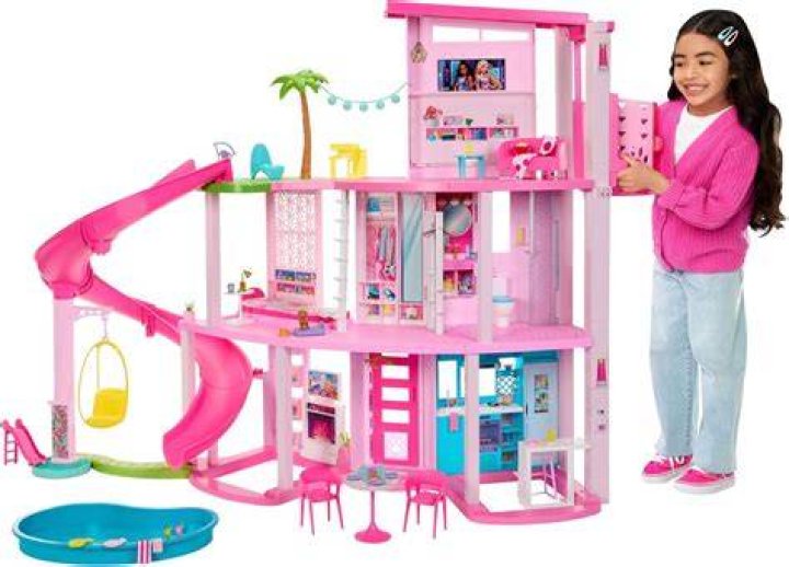 How do you play with a Barbie doll