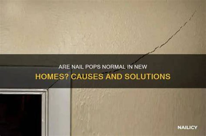 What causes nail pops in new construction