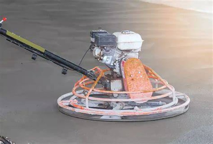 What does a trowel machine do