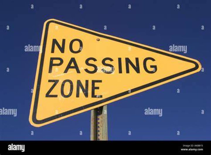 What does no passing zone sign mean