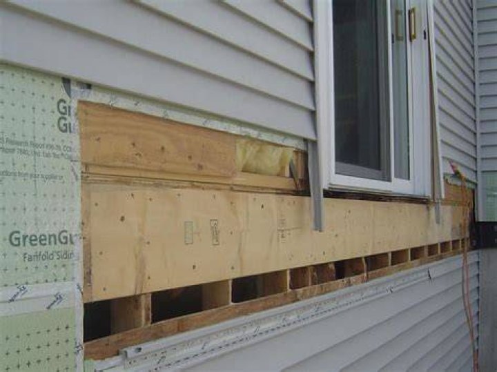 What goes under vinyl siding