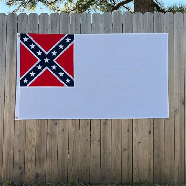 When was John Agards flag written