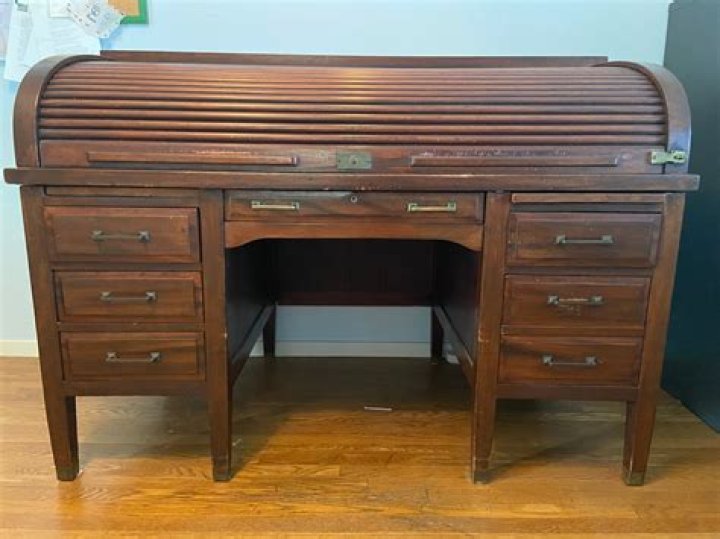 When were roll top desks invented