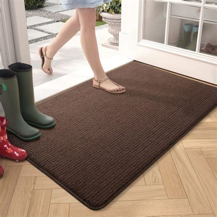 Where should door mats be placed