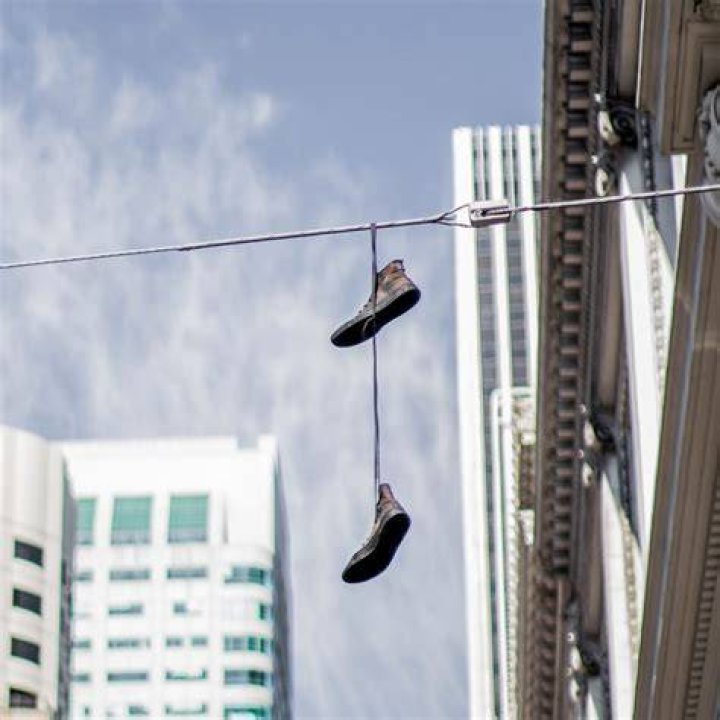Why do they throw shoes on wires