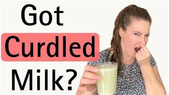 Why does milk and Red Bull react