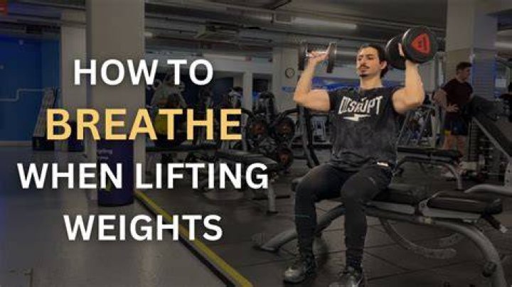Why should you breathe rhythmically while lifting weights